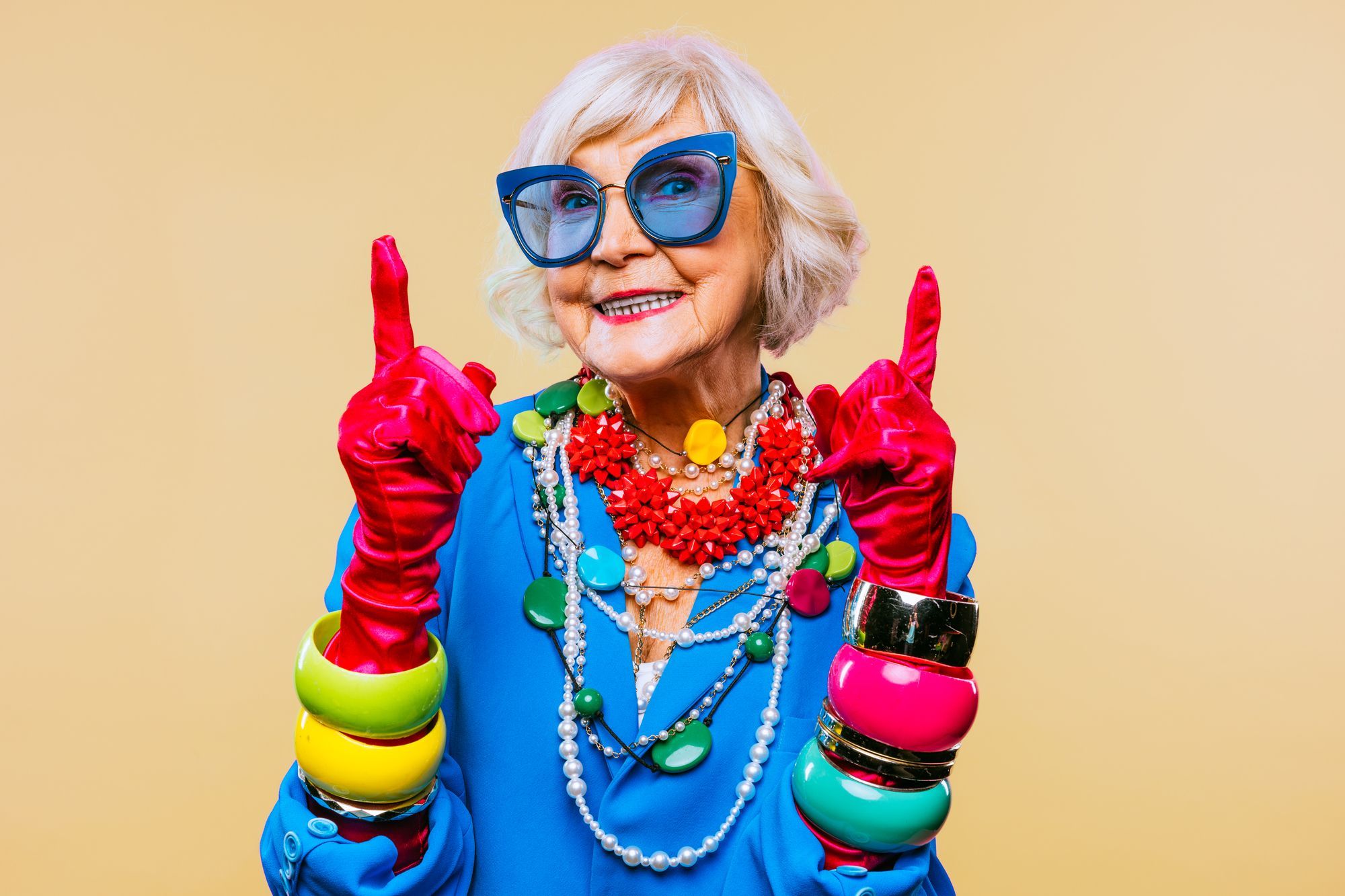 Colorful, eccentric older woman illustrating a bold brand voice full of personality.