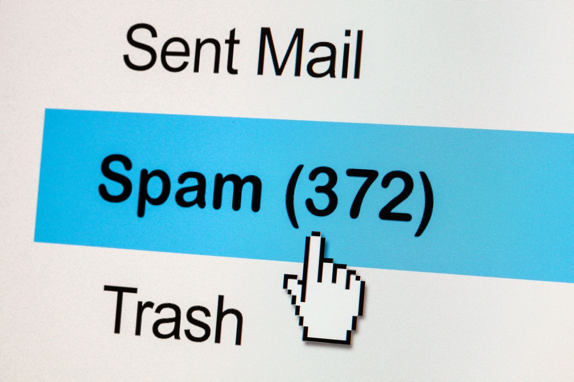 Cursor hovering over a full spam folder, illustrating the risk of poor email compliance and damaged deliverability.