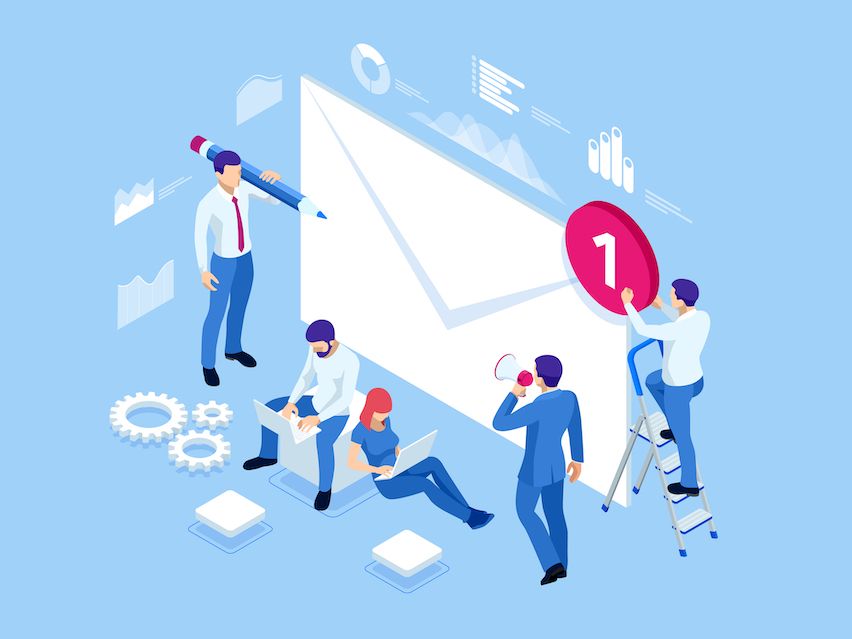 Team strategizing around an email, depicting strategies for growing and managing an engaged mass email newsletter list.